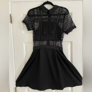 Danity black short dress (above knees) with a collar